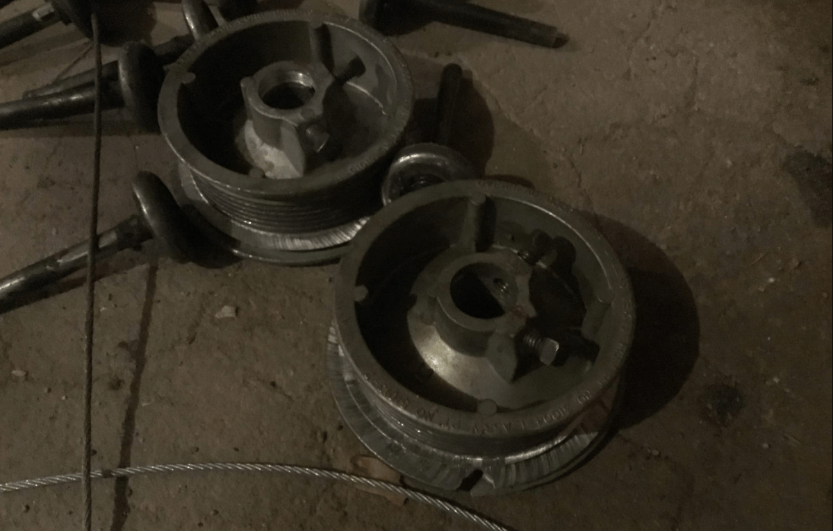 BROKEN GARAGE DOOR TORSION DRUMS